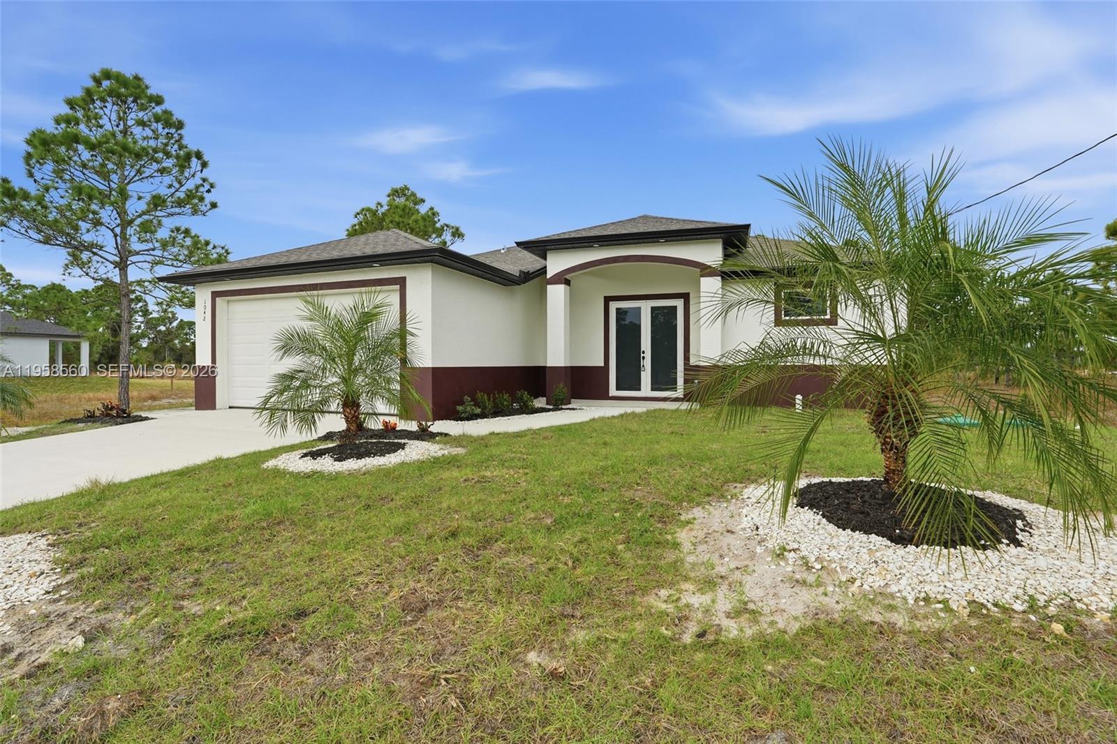 1042 MARSHALL AVE, Lehigh Acres FL 33974 photo 2