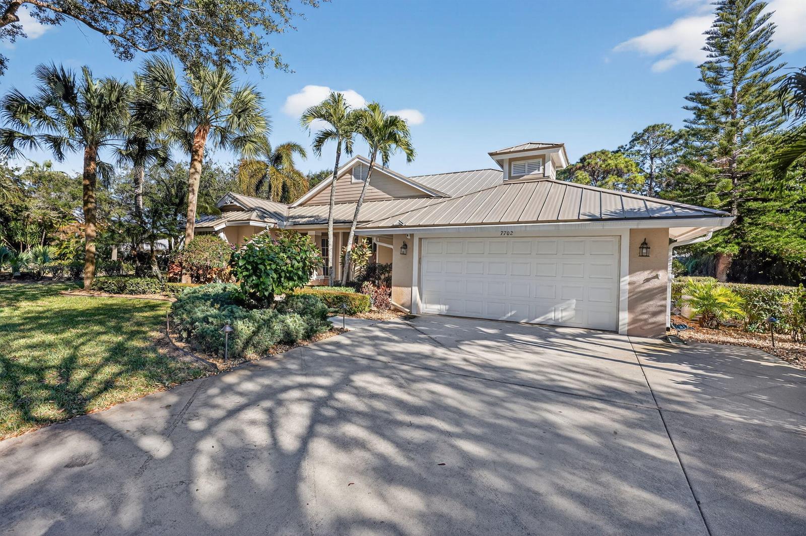 7702 SE Mammoth Drive, Hobe Sound FL 33455 photo 2