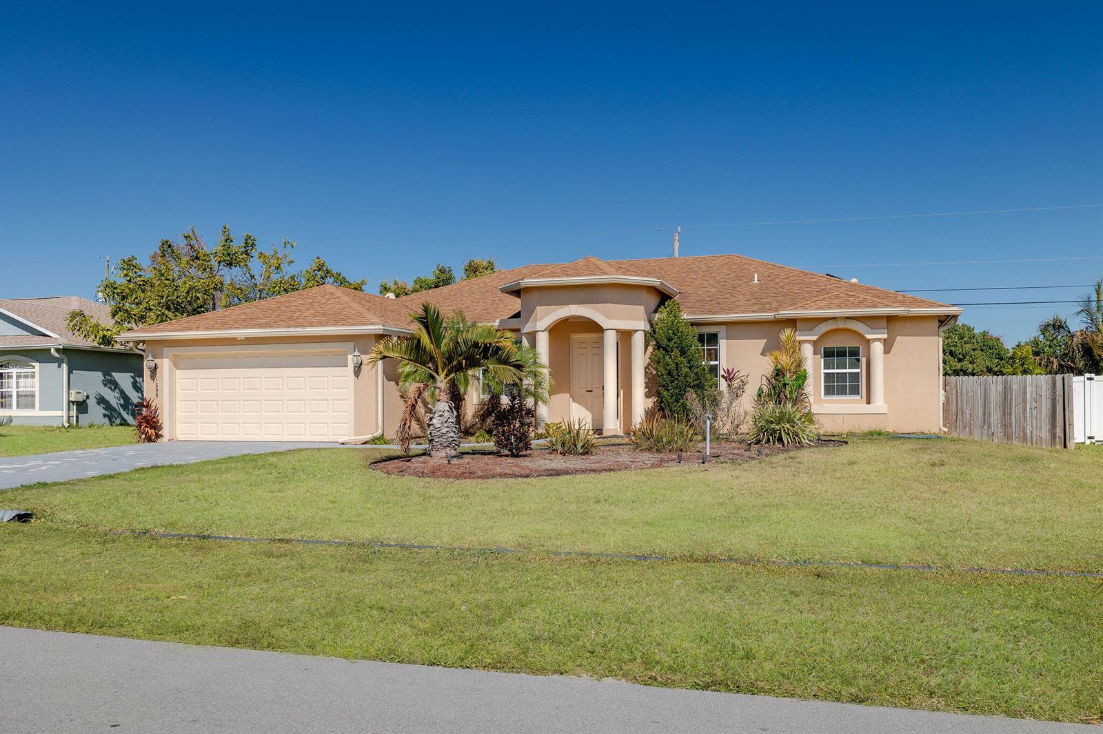 1585 SW Merchant Lane, Port St. Lucie FL 34953