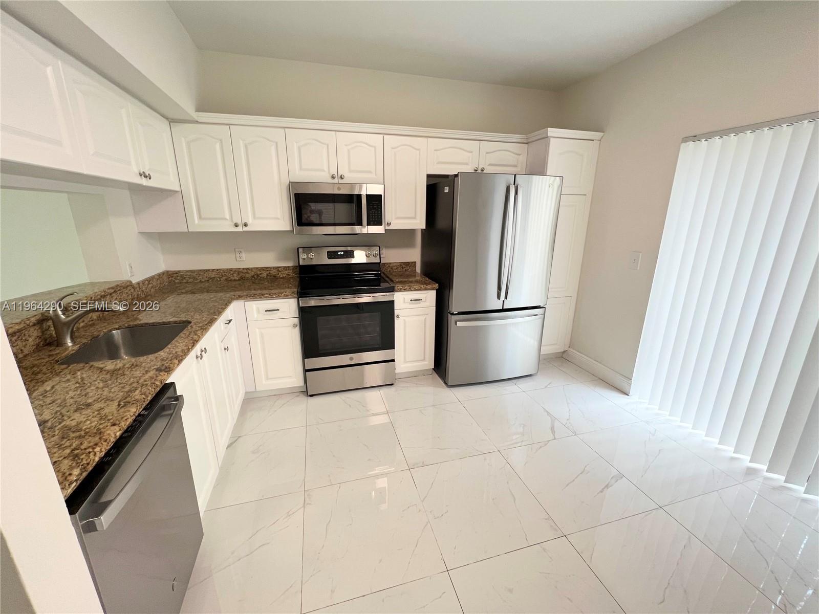 9820 NW 56th Pl, Coral Springs FL 33076 photo 2