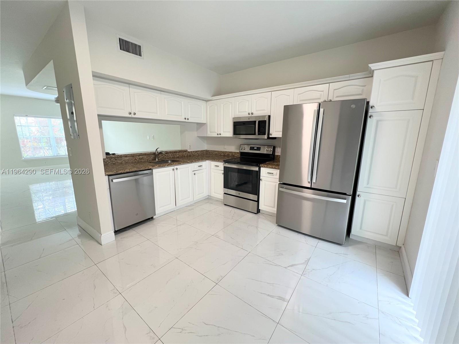 9820 NW 56th Pl, Coral Springs FL 33076 photo 3