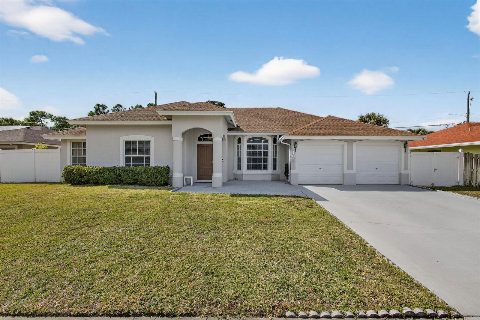 102 Brook Woode Court, Royal Palm Beach FL 33411