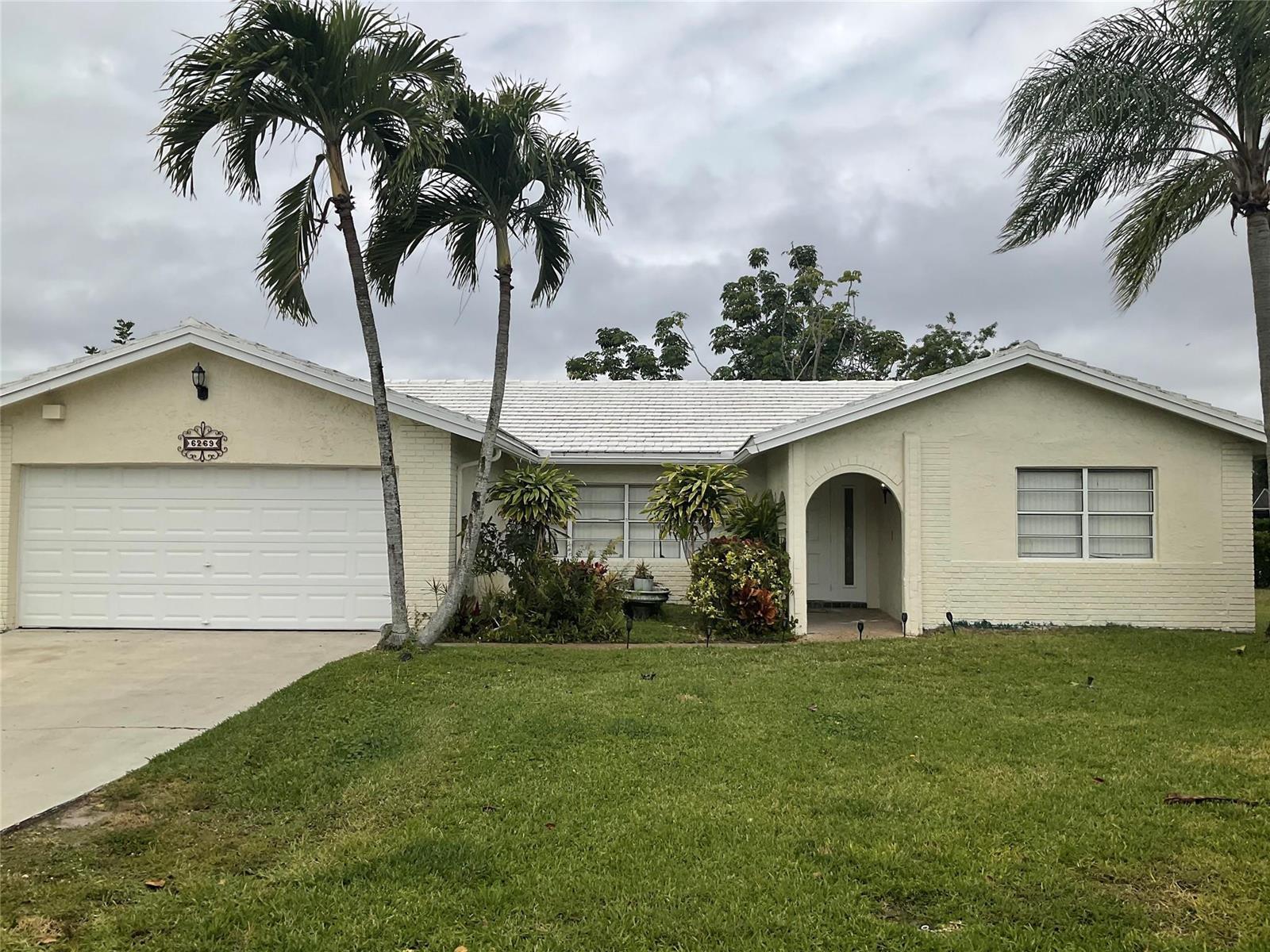 6269 Woodbury Road, Boca Raton FL 33433