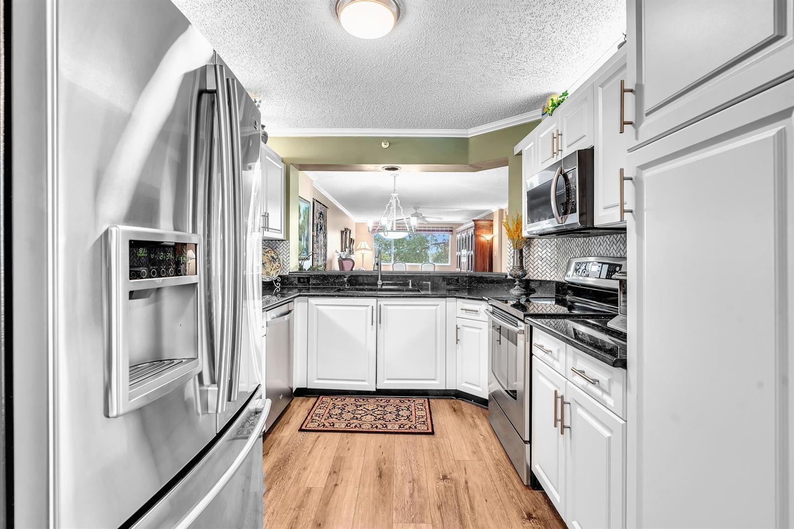 9587 Weldon Circle # B311, Tamarac FL 33321 photo 4