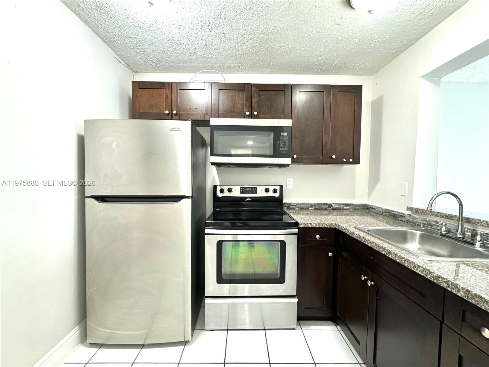 484 NW 165th St Rd # 411, Miami FL 33169 photo 2