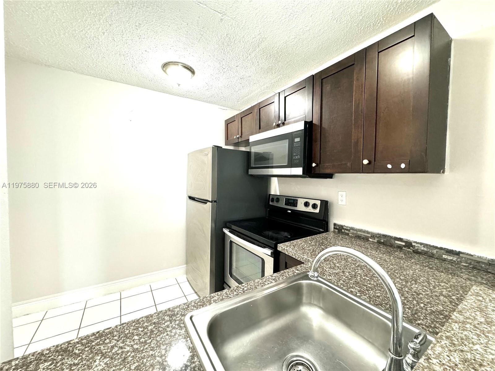 484 NW 165th St Rd # 411, Miami FL 33169 photo 3