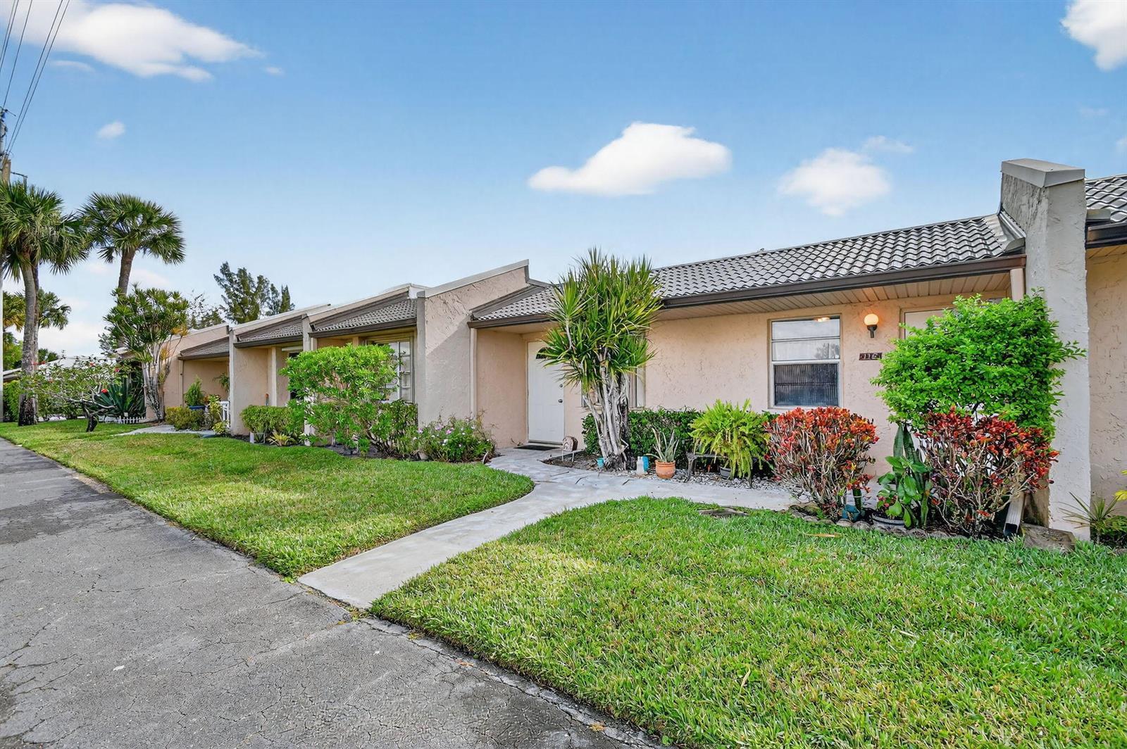 116 Golden Lakes Boulevard, West Palm Beach FL 33411 photo 3