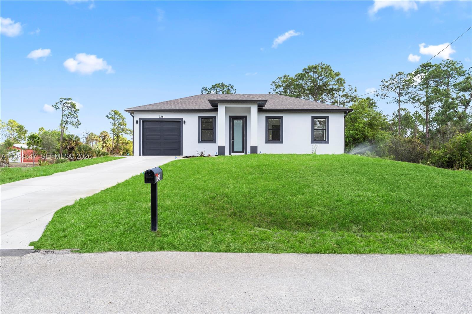326 Louis ave, Lehigh Acres FL 33936 photo 2