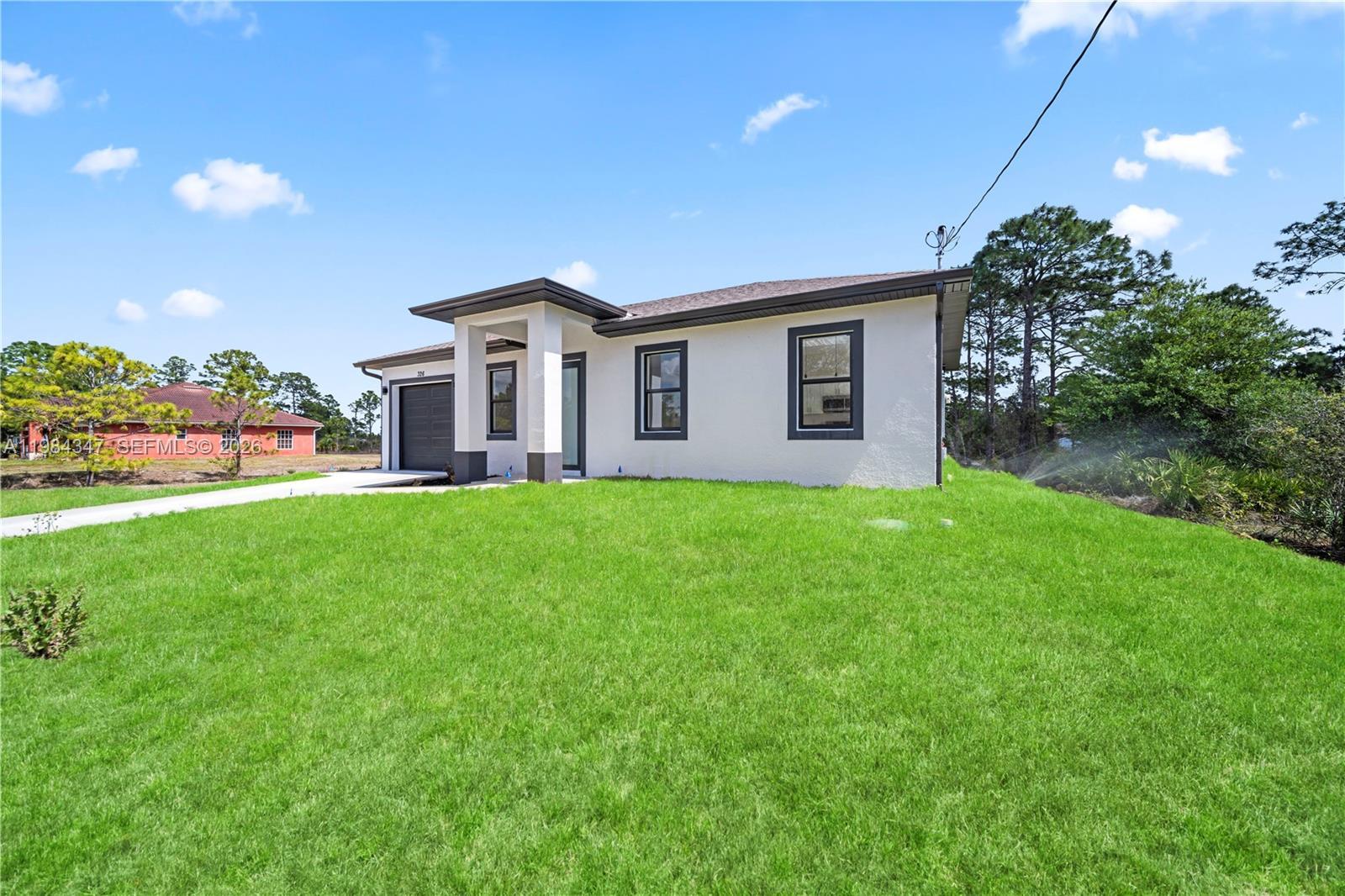 326 Louis ave, Lehigh Acres FL 33936 photo 3