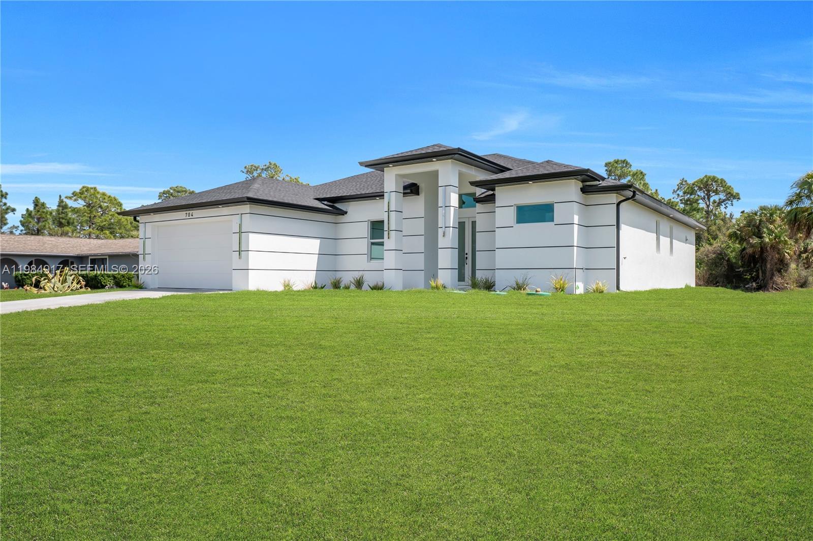 704 Clayton, Lehigh Acres FL 33972 photo 4