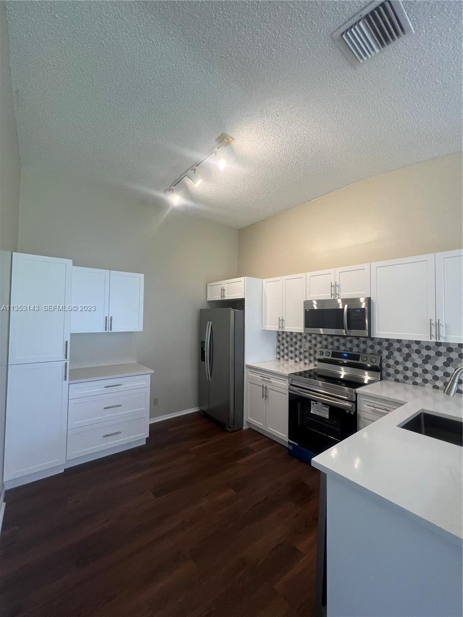 2306 Maplewood Drive, FL 33415