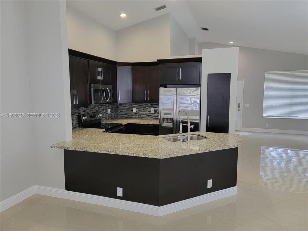 928 Falling Water Road, Weston FL 33326