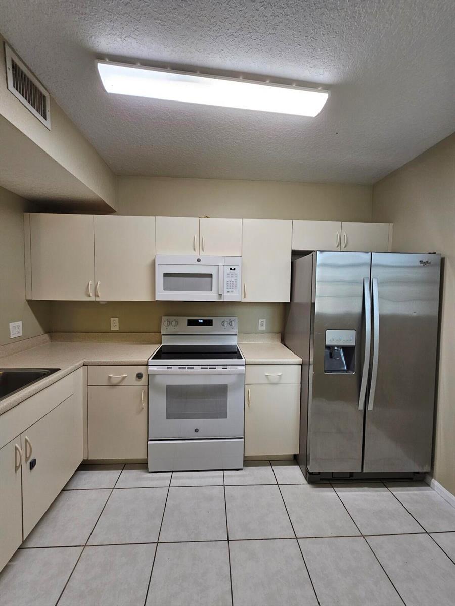 1063 Golden Lakes Boulevard # 311, West Palm Beach FL 33411 photo 4