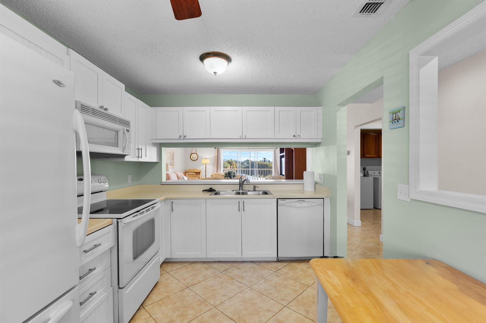 3071 Sandpiper Bay Circle # L304, Naples FL 34112 photo 5