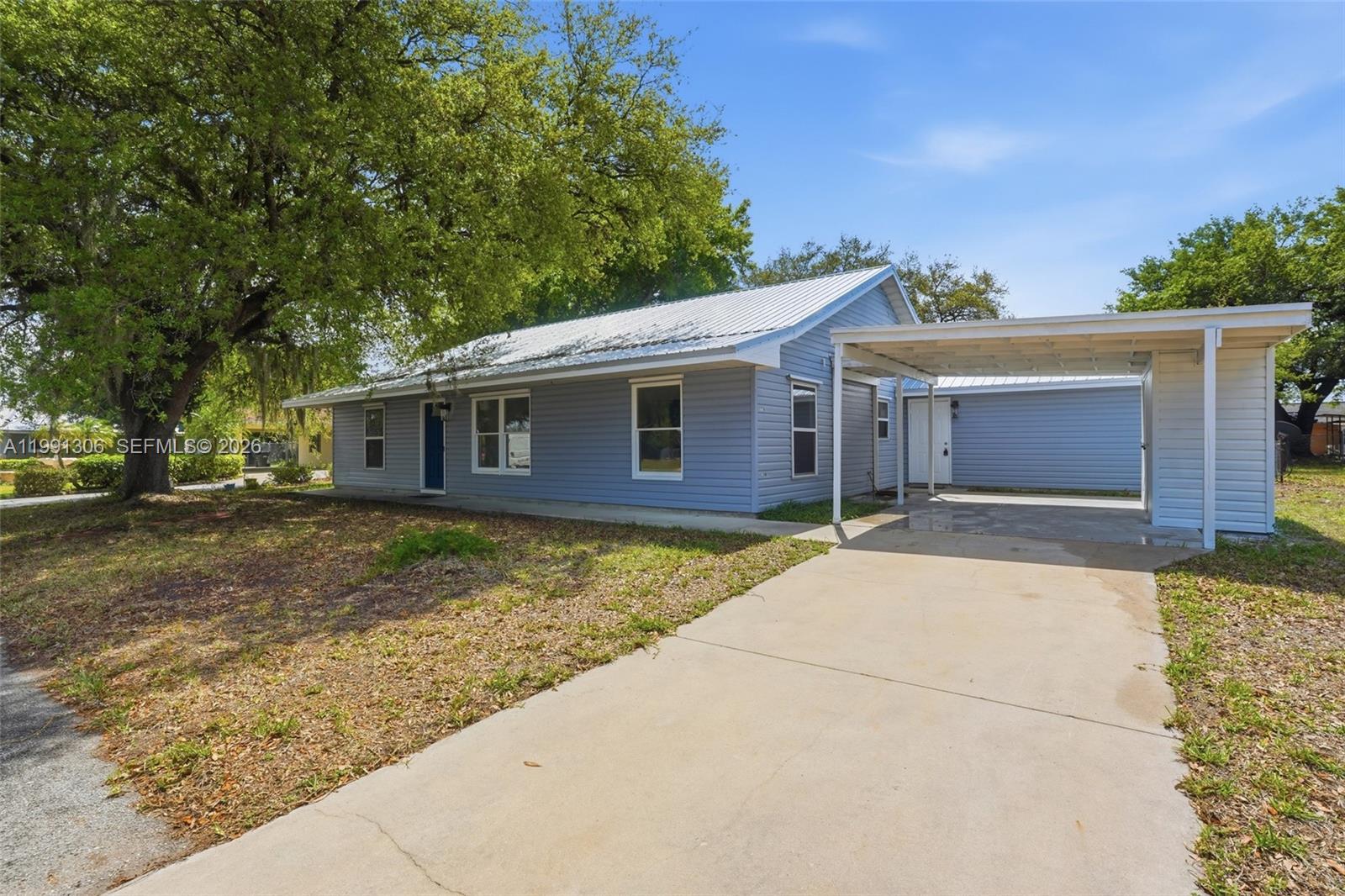 210 E SUGARLAND CIR, Clewiston FL 33440 photo 3