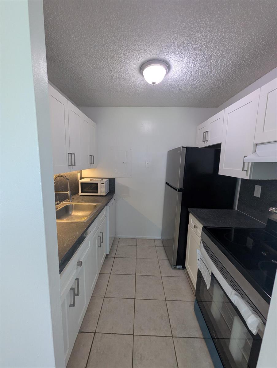 1203 N Benoist Farms Road # 107, West Palm Beach FL 33411