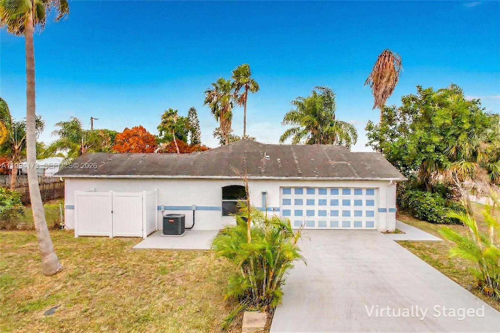 701 SW Amber Ter, Port St. Lucie FL 34953