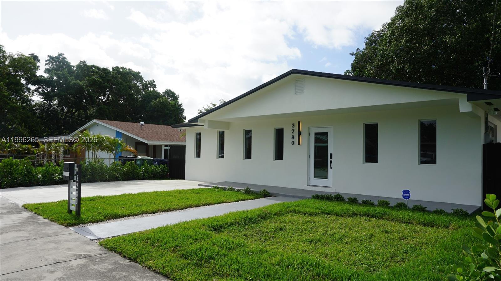 3280 NW 51st Ter, Miami FL 33142 photo 2