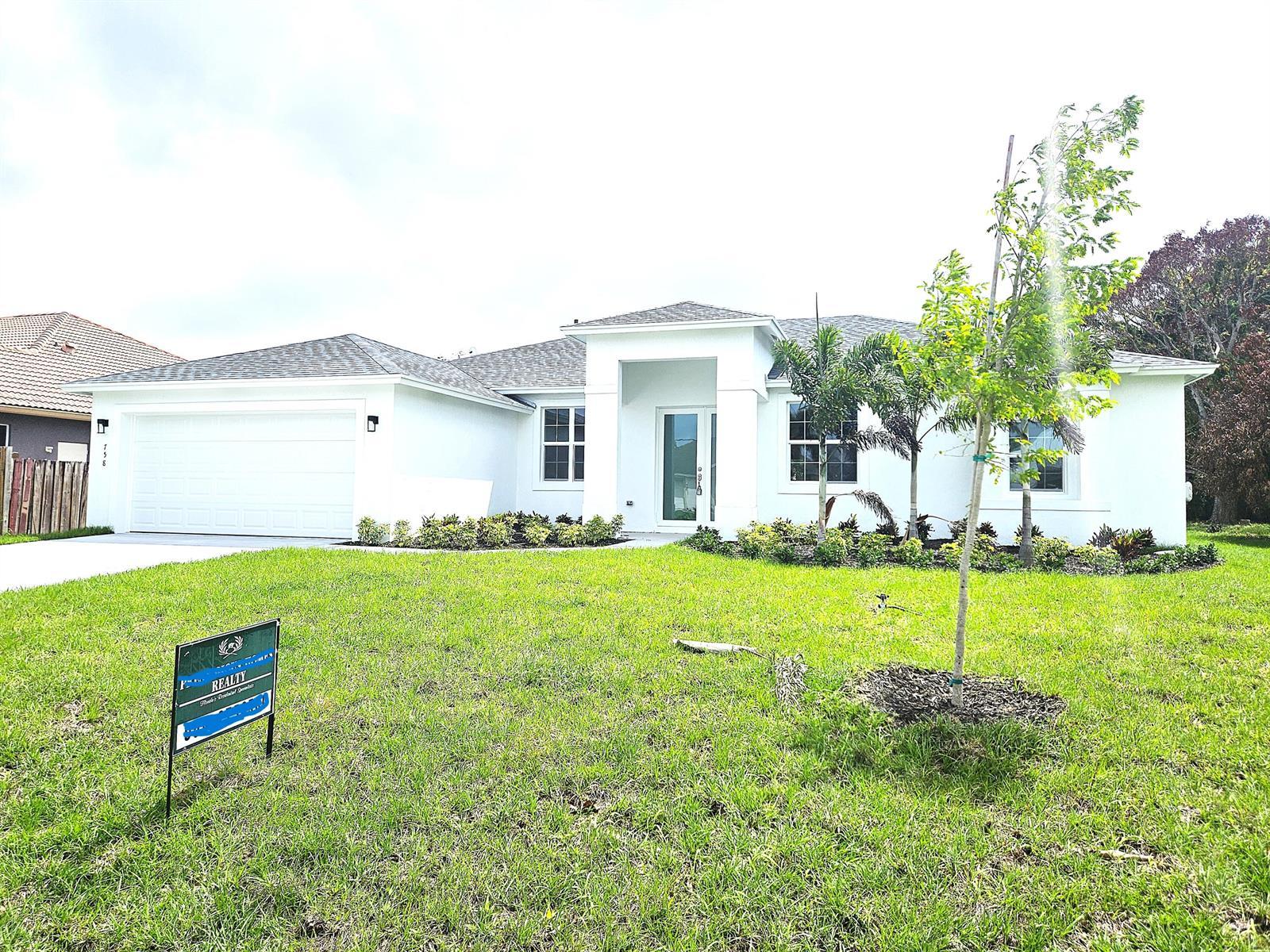 758 SW Mccoy Avenue, Port St. Lucie FL 34953