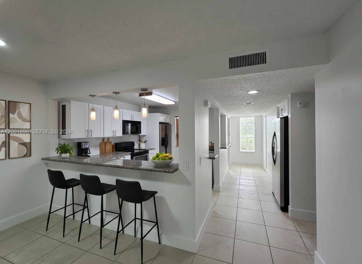 310 Racquet Club Rd # 204, Weston FL 33326
