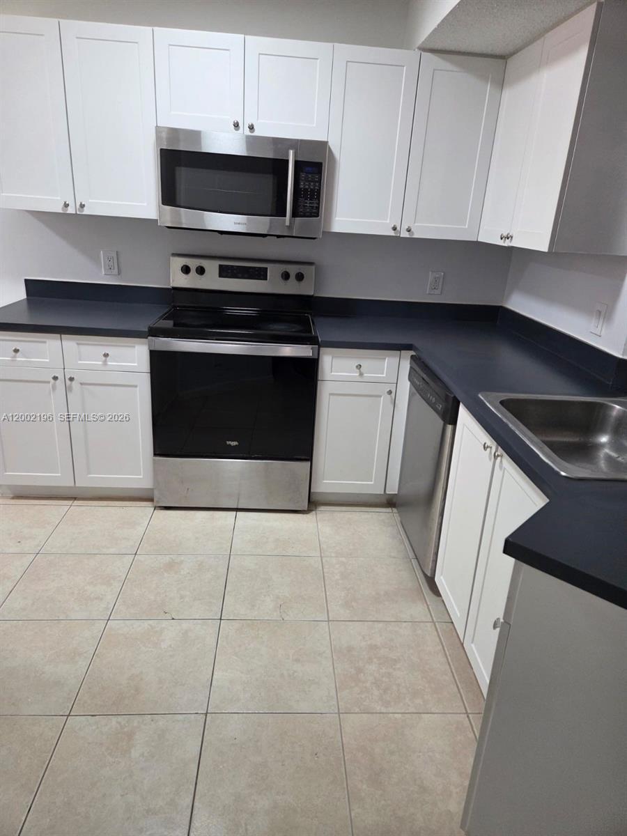 8871 Wiles Rd # 208, Coral Springs FL 33067 photo 2