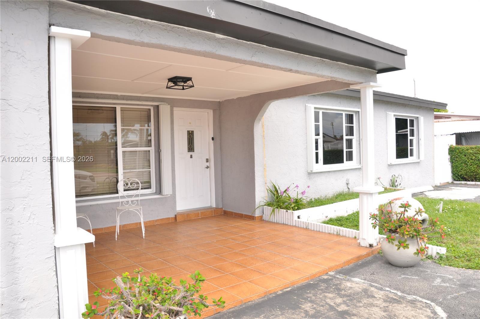 1301 W 61st Pl, Hialeah FL 33012 photo 2