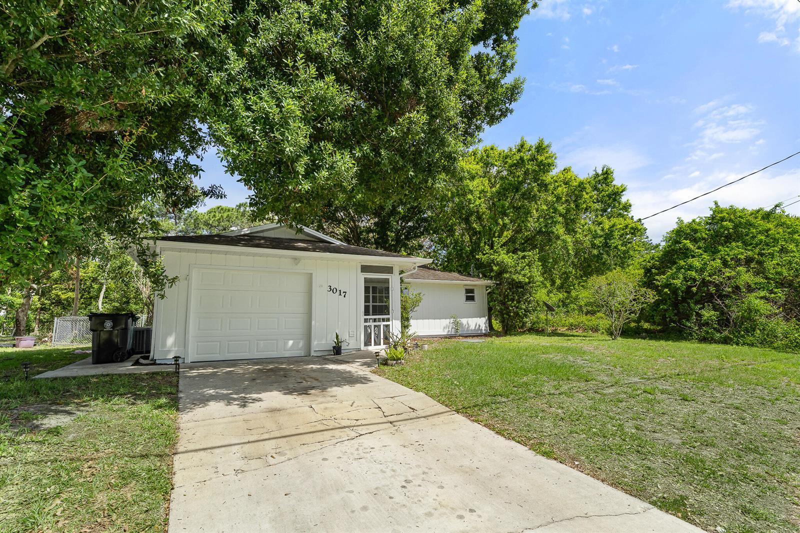 3017 SW Collings Drive, Port St. Lucie FL 34953 photo 4