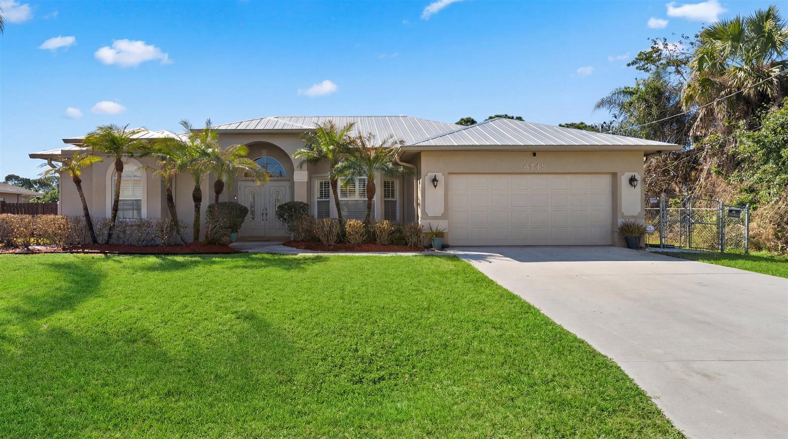 6148 NW Gaylord Terrace, Port St. Lucie FL 34986 photo 2