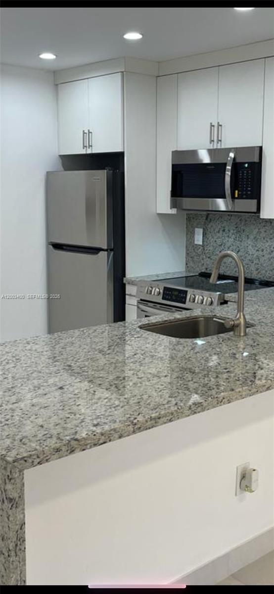 7732 Camino Real # 318, Miami FL 33143