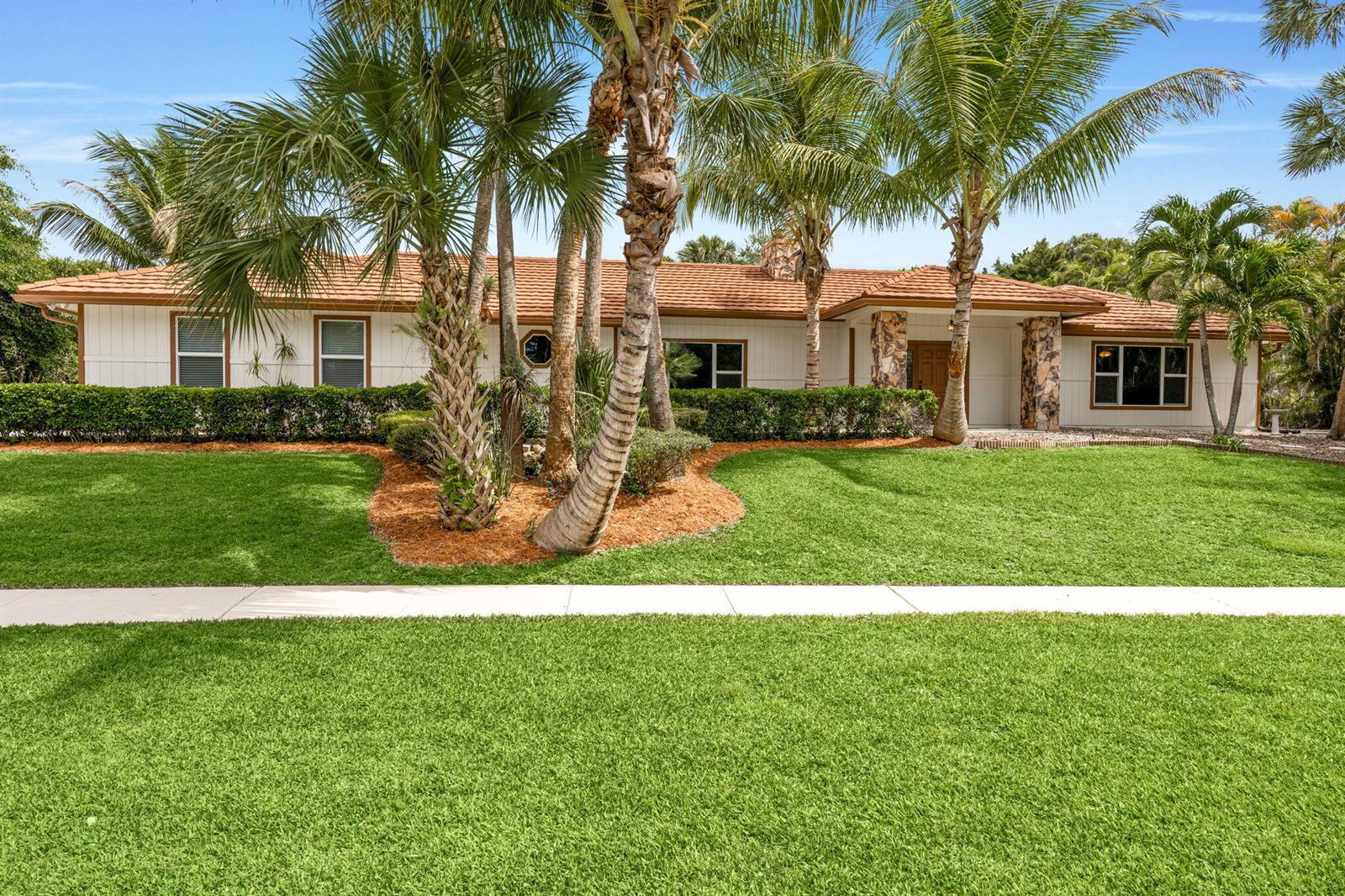 21 Whispering Oaks Circle, West Palm Beach FL 33411 photo 2