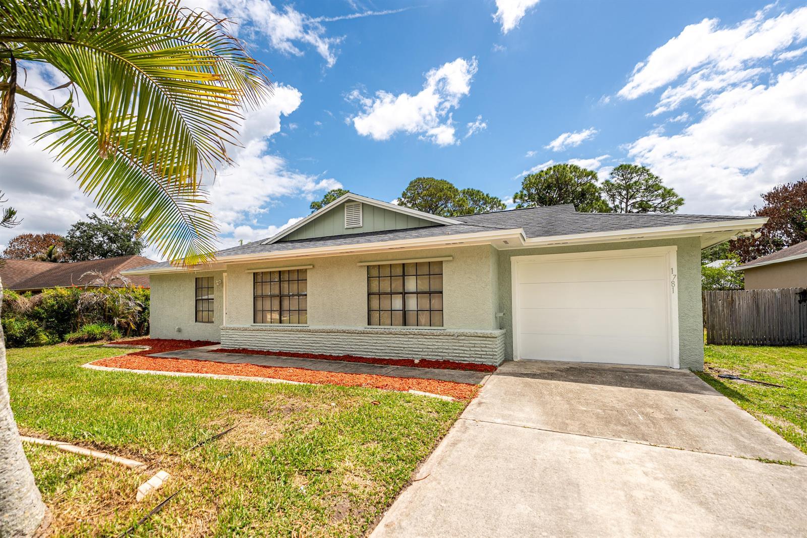 1781 SW Cloverleaf Street, Port St. Lucie FL 34953