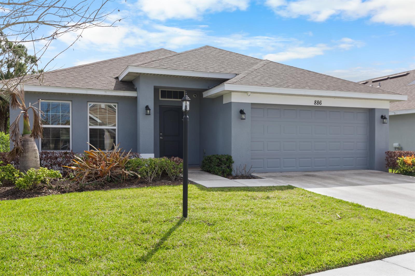 886 NE Whistling Duck Way, Port St. Lucie FL 34983 photo 2