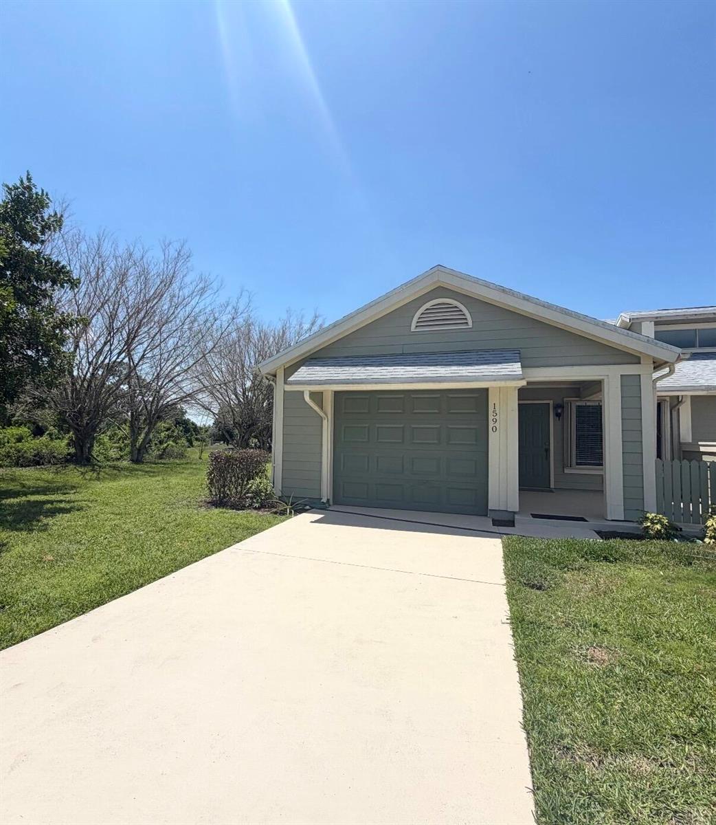 1590 SE Dewberry Court, Port St. Lucie FL 34952 photo 2