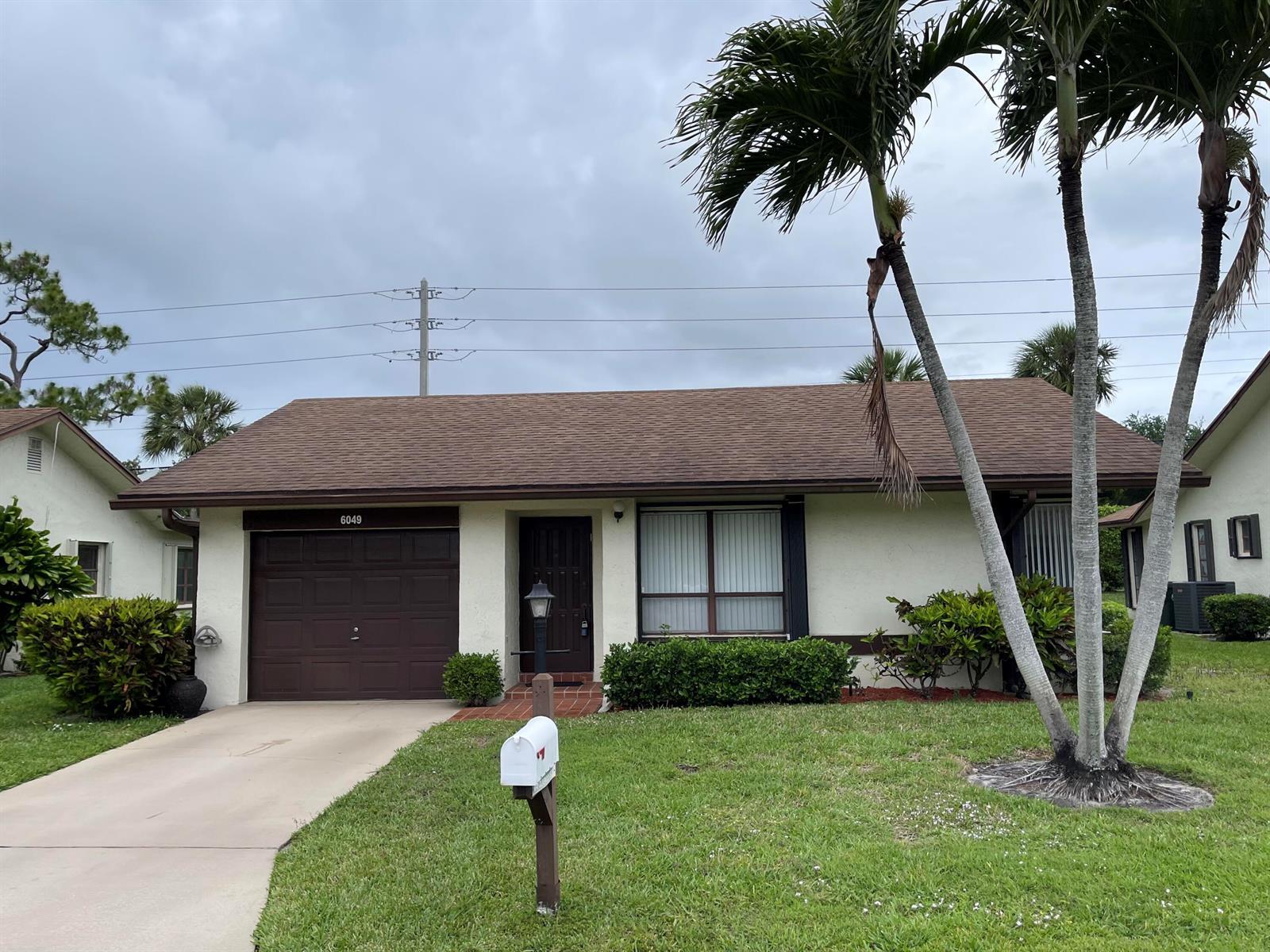 6049 Olivewood Circle, FL 33463