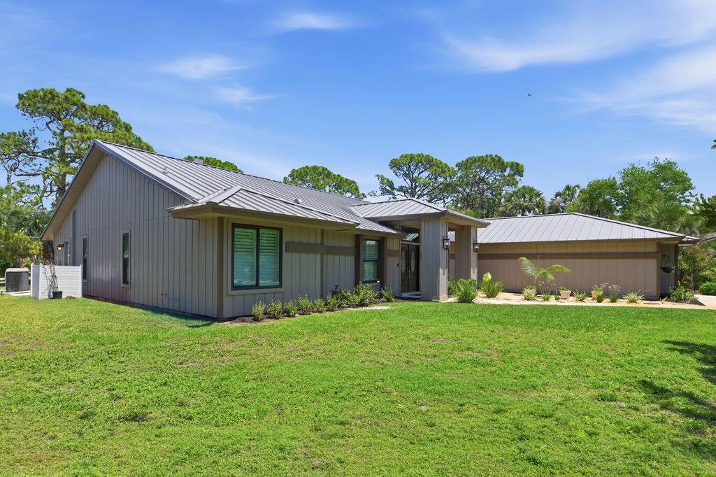 835 N East Stokes Terrace, Jensen Beach FL 34957 photo 2