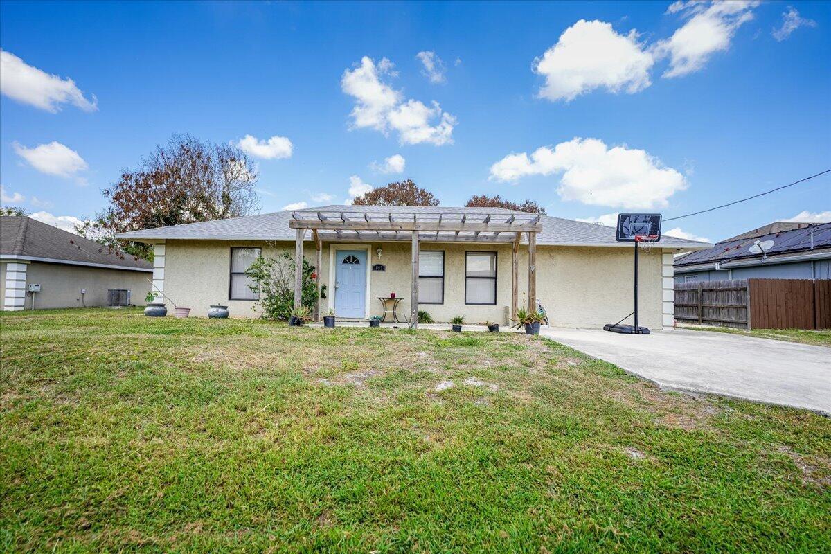 667 SE Faith Terrace, Port St. Lucie FL 34983 photo 2