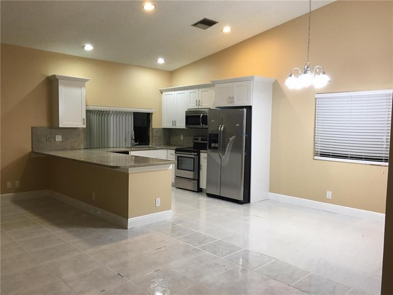 9555 NW 25th Court, Coral Springs FL 33065 photo 2