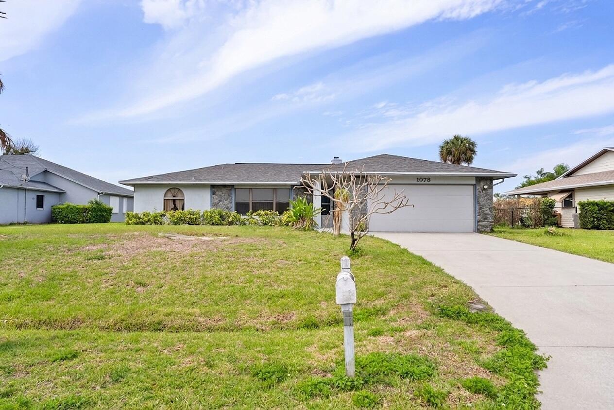 1078 SW Sultan Drive, Port St. Lucie FL 34953 photo 2