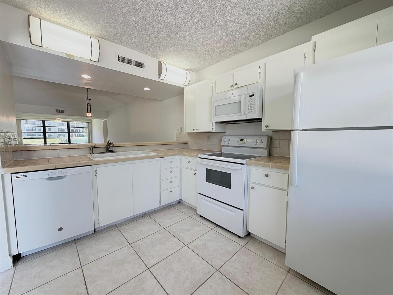 3511 Village Boulevard Unit 103, West Palm Beach FL 33409