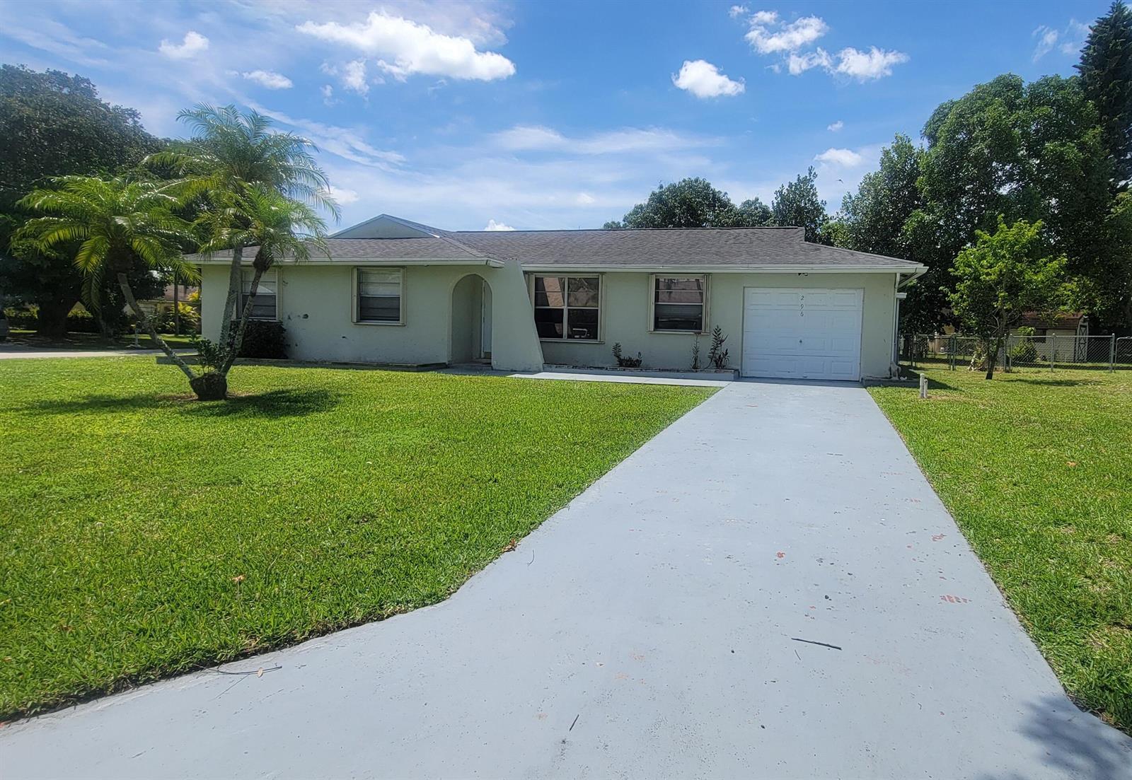 296 Sandpiper Avenue, Royal Palm Beach FL 33411