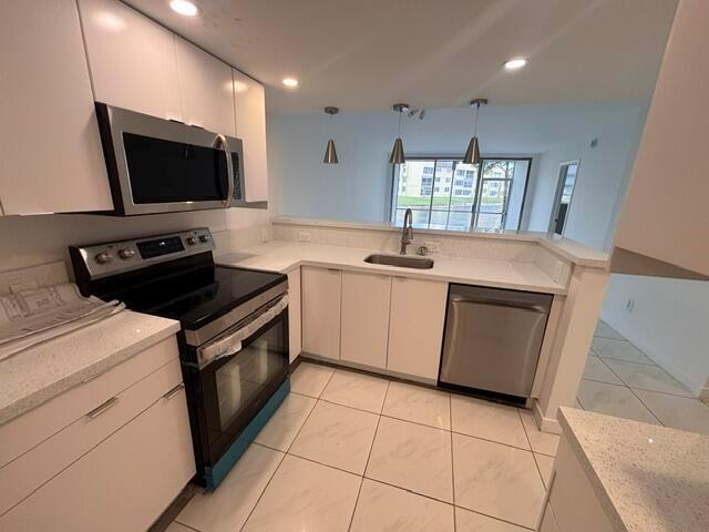 6051 NW 61st Avenue # 103, Tamarac FL 33319 photo 2