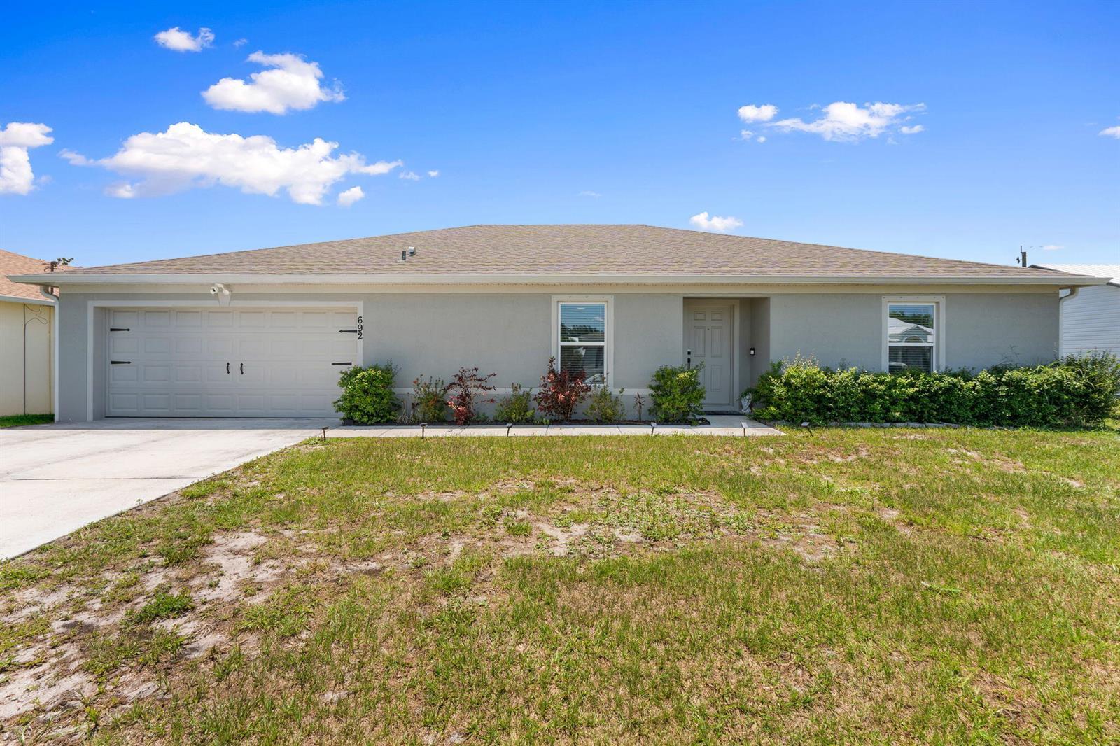 692 SW Hamberland Avenue, Port St. Lucie FL 34953 photo 2