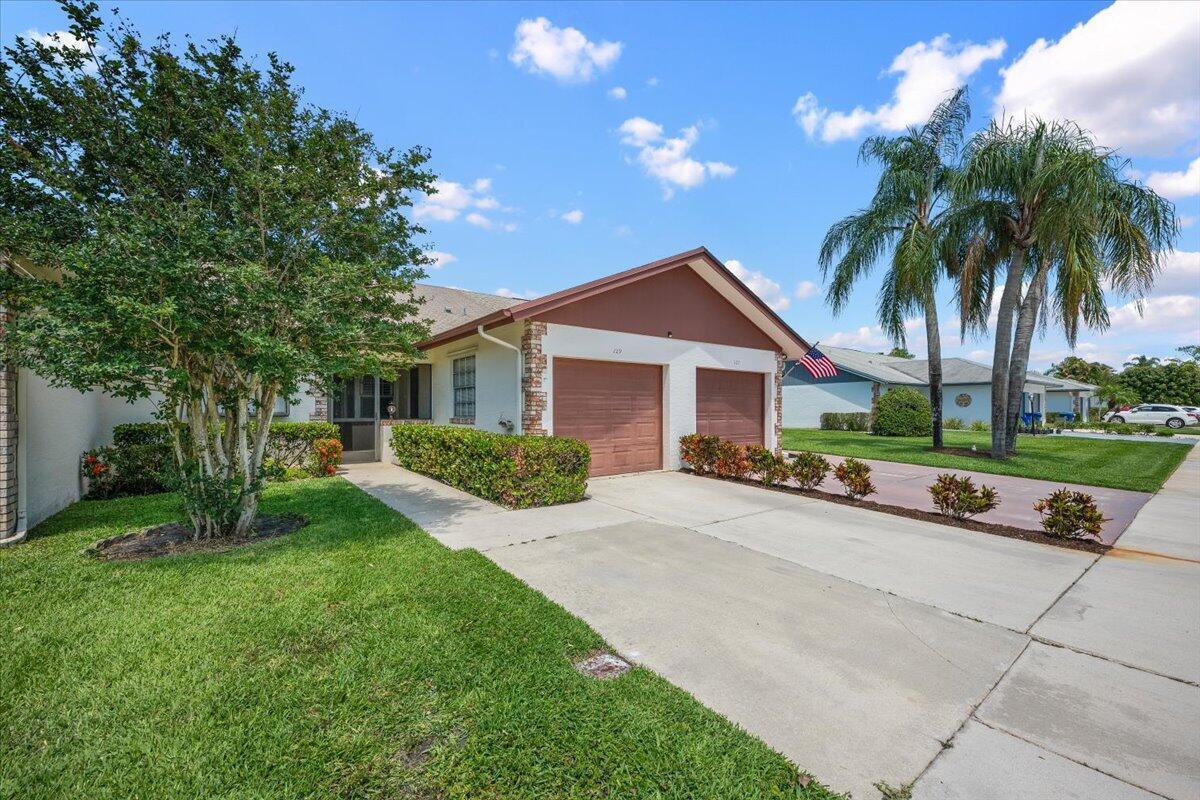 129 Moccasin Trail S, Jupiter FL 33458 photo 2