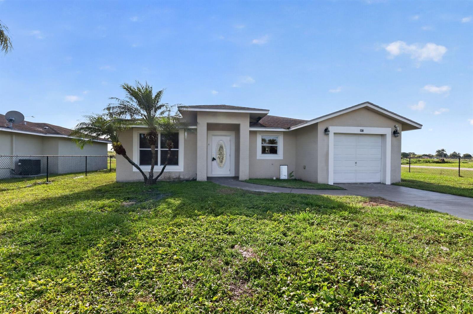 138 Dabou Loop, Belle Glade FL 33430