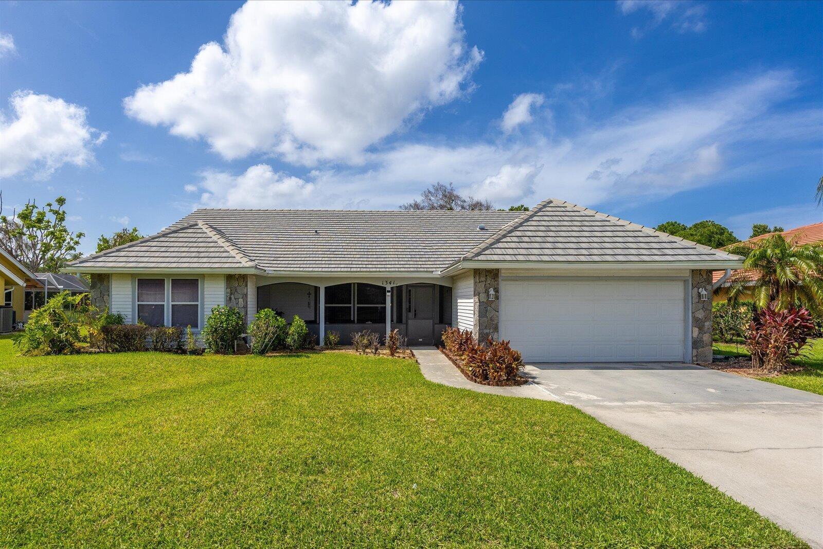 1341 SW Maplewood Drive, Port St. Lucie FL 34986 photo 2