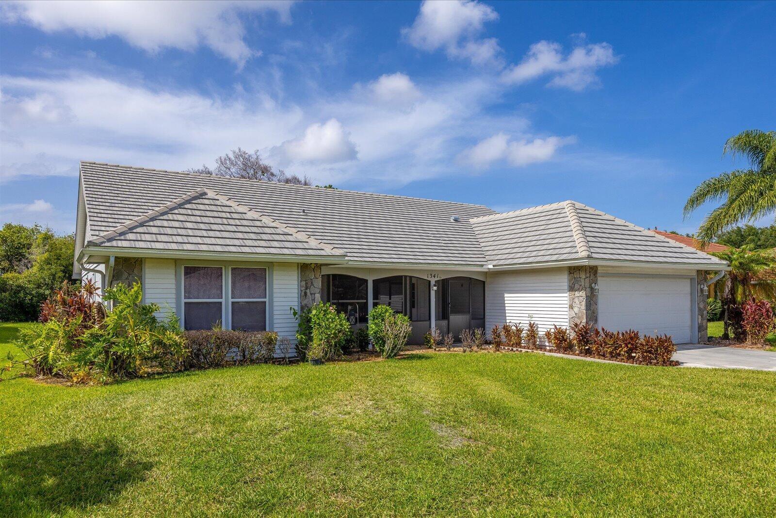 1341 SW Maplewood Drive, Port St. Lucie FL 34986 photo 3