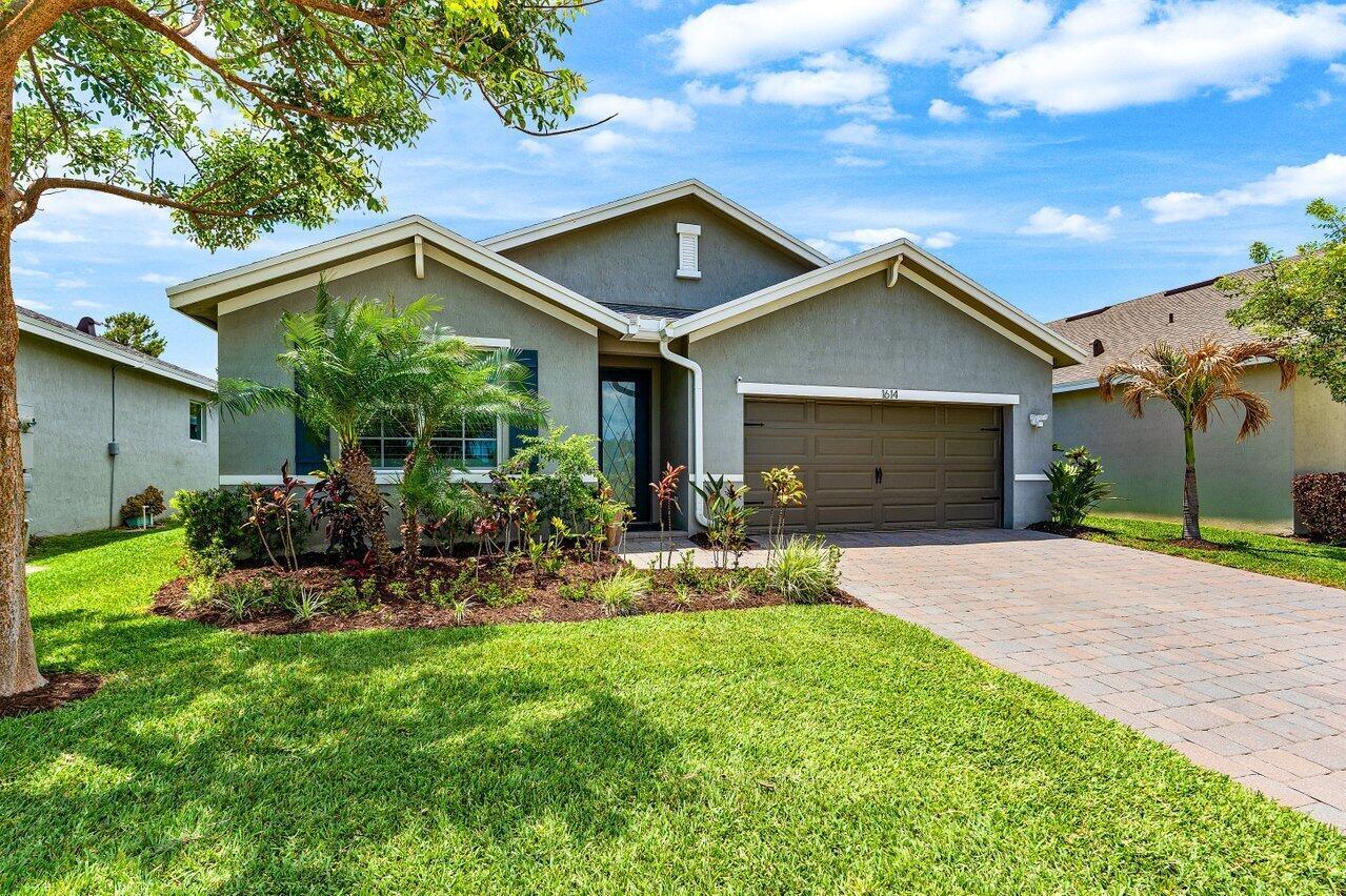 1614 NE White Pine Terrace, Ocean Breeze FL 34957 photo 2