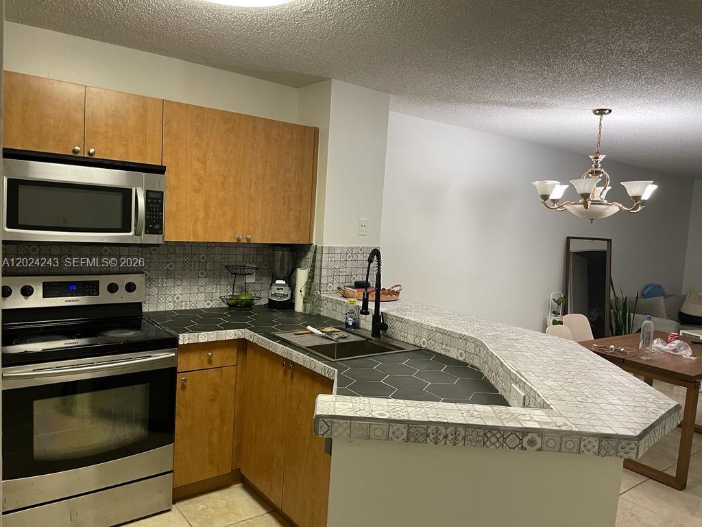8750 N Sherman Cir # 208, Miramar FL 33025 photo 2