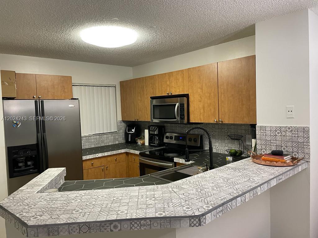 8750 N Sherman Cir # 208, Miramar FL 33025