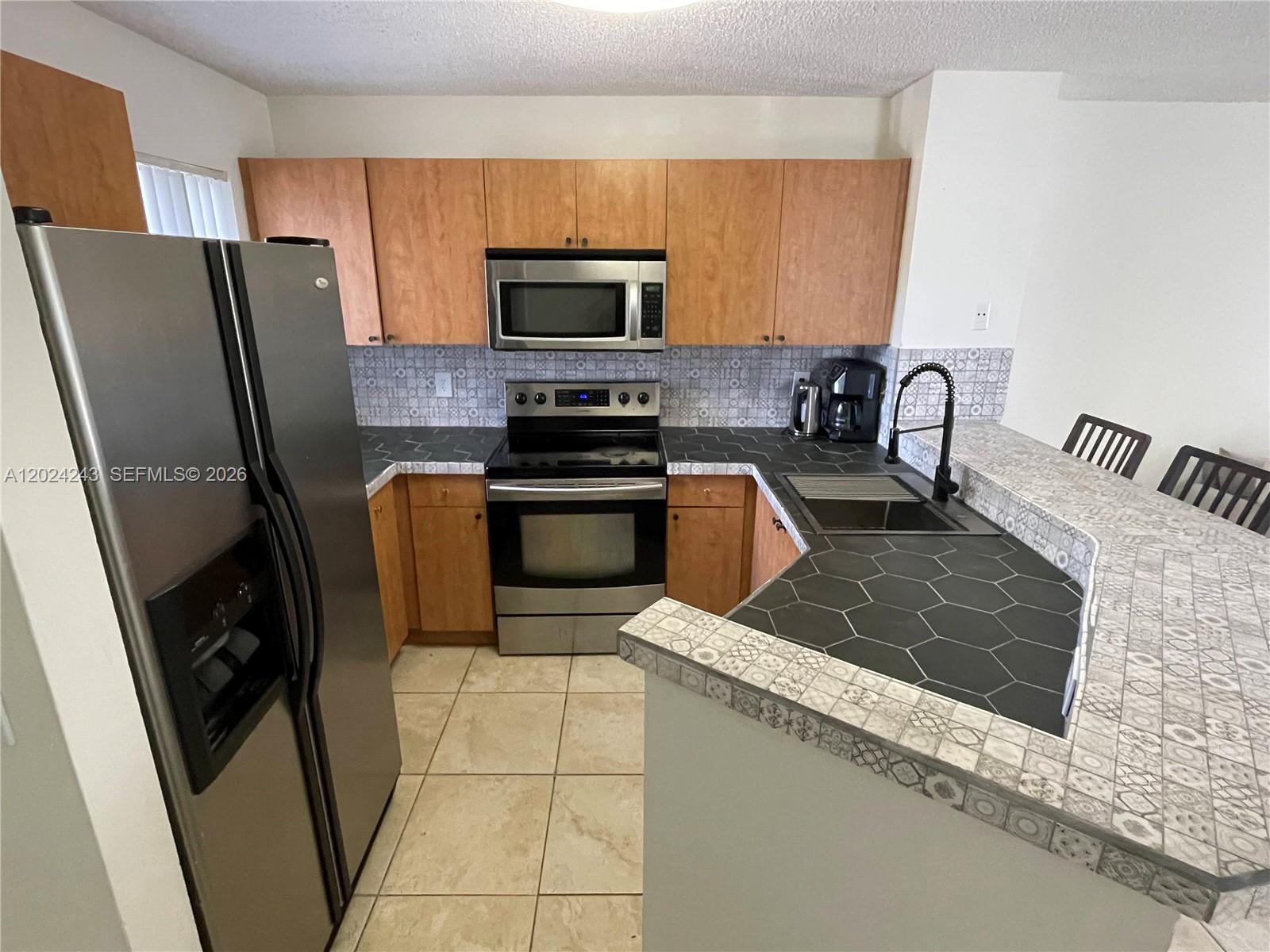 8750 N Sherman Cir # 208, Miramar FL 33025 photo 4